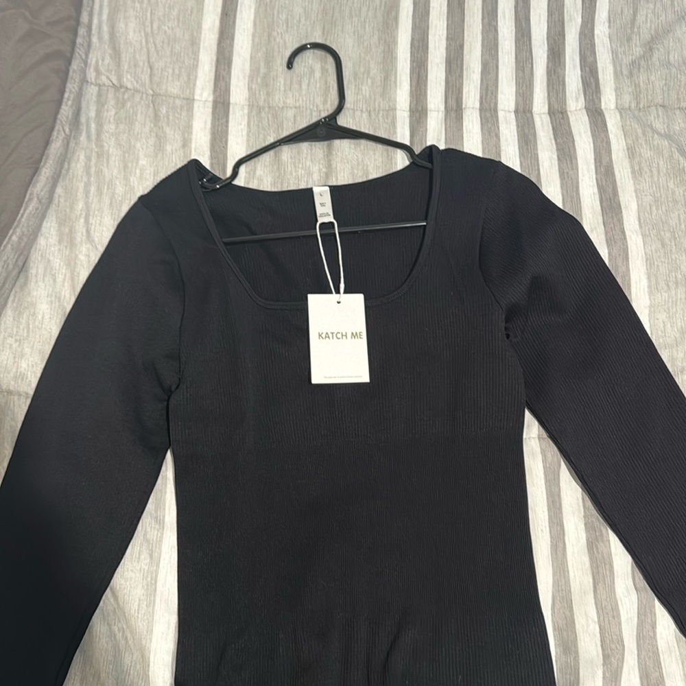 Black full body suit